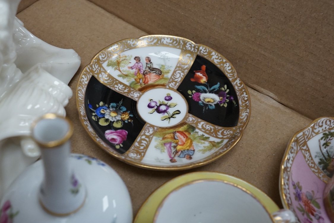 A group of 19th/20th century German porcelain, comprising a Nymphenburg pug, seven Dresden miniature cups and saucers and a Meissen bottle, largest 13cm high